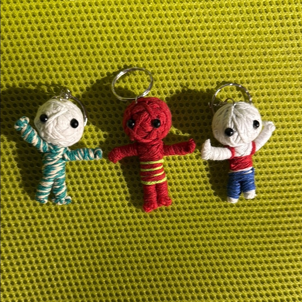 Choose one nwot Colorful voodoo inspired Yarn Doll Keychains Set